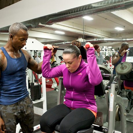 Ron Aigle Fitness Trainer with client at the Gym Clinic Ron Aigle Fitness Trainer with client at the Gym Clinic